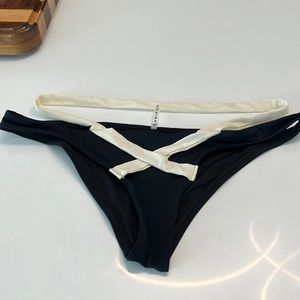 Vitamin A bikini great condition in a medium black with cream